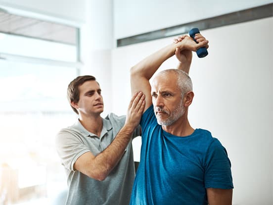 Man at physio appointment