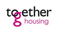 Together Housing logo with the word "together" in black and pink, and "housing" in pink underneath.