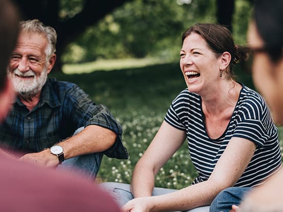 woman-in-park-with-friends