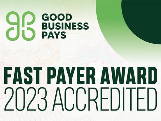 Graphic with "Good Business Pays" logo and "Fast Payer Award 2023 Accredited" text in green on a light background.