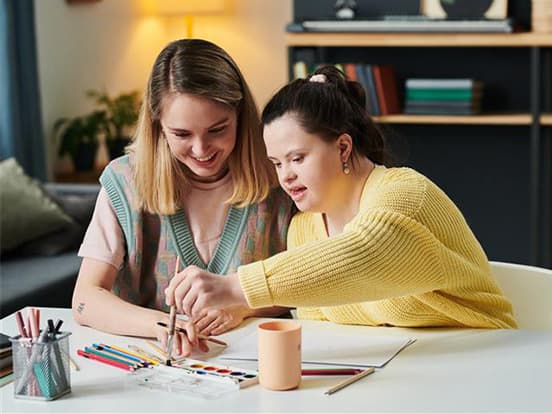 two-women-painting-together