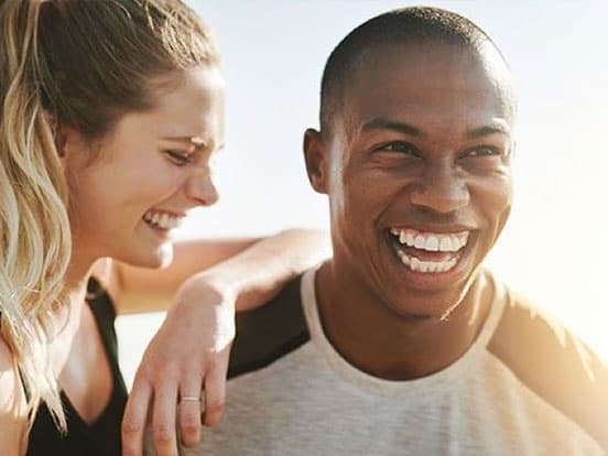 Healthy man with lady smiling