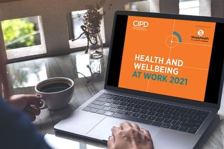 CIPD health and wellbeing at work report 2021 front cover on a laptop screen