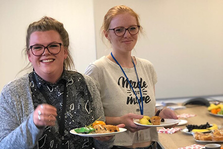 Simplyhealth colleagues enjoy breakfast together as part of employee wellbeing programme