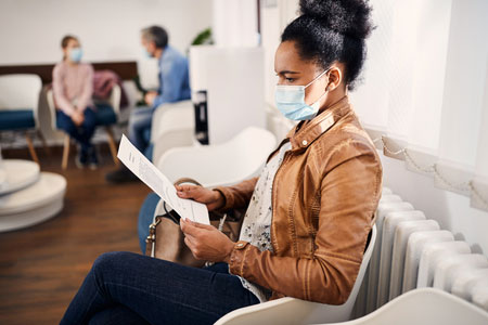 Patient wearing mask in waiting room