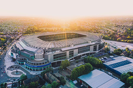 Twickenham Stadium with sun setting behind