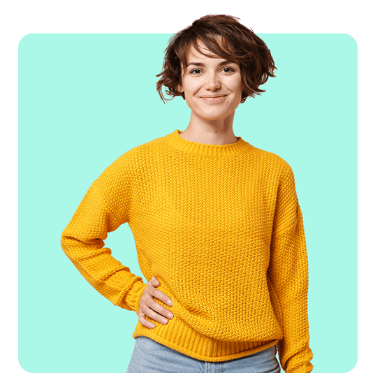 Woman wearing yellow jumper and smiling