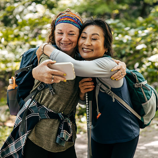 Two women taking a selfie whilst hiking