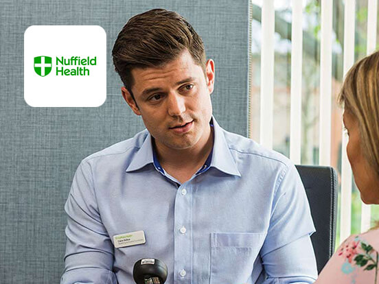 Nuffield Health logo on image of doctor and patient at health assessment