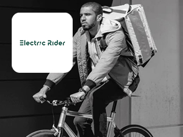 Electric Rider logo on image of man riding an electric bicycle