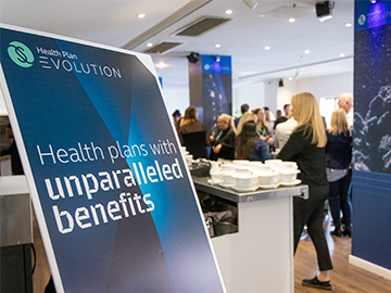 A poster board advertising Simplyhealth's health plan Evolution 
