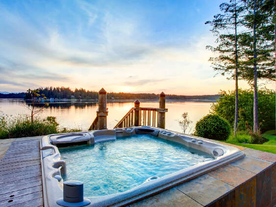 Hot tub overlooking a lake