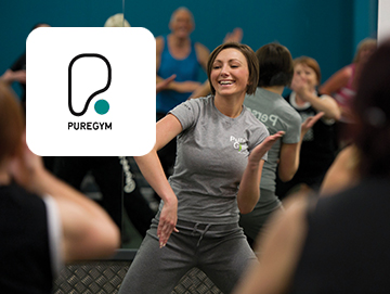 Pure Gym logo on image of woman teaching exercise class