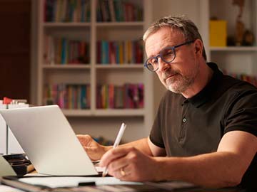 Man working at laptop from home