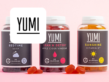 Yumi logo on image of gummy vitamin bottles