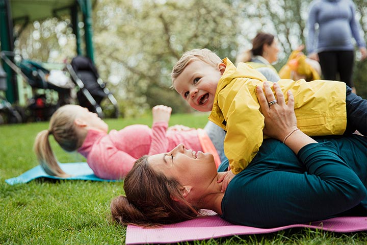 Mother and her child doing exercises outside